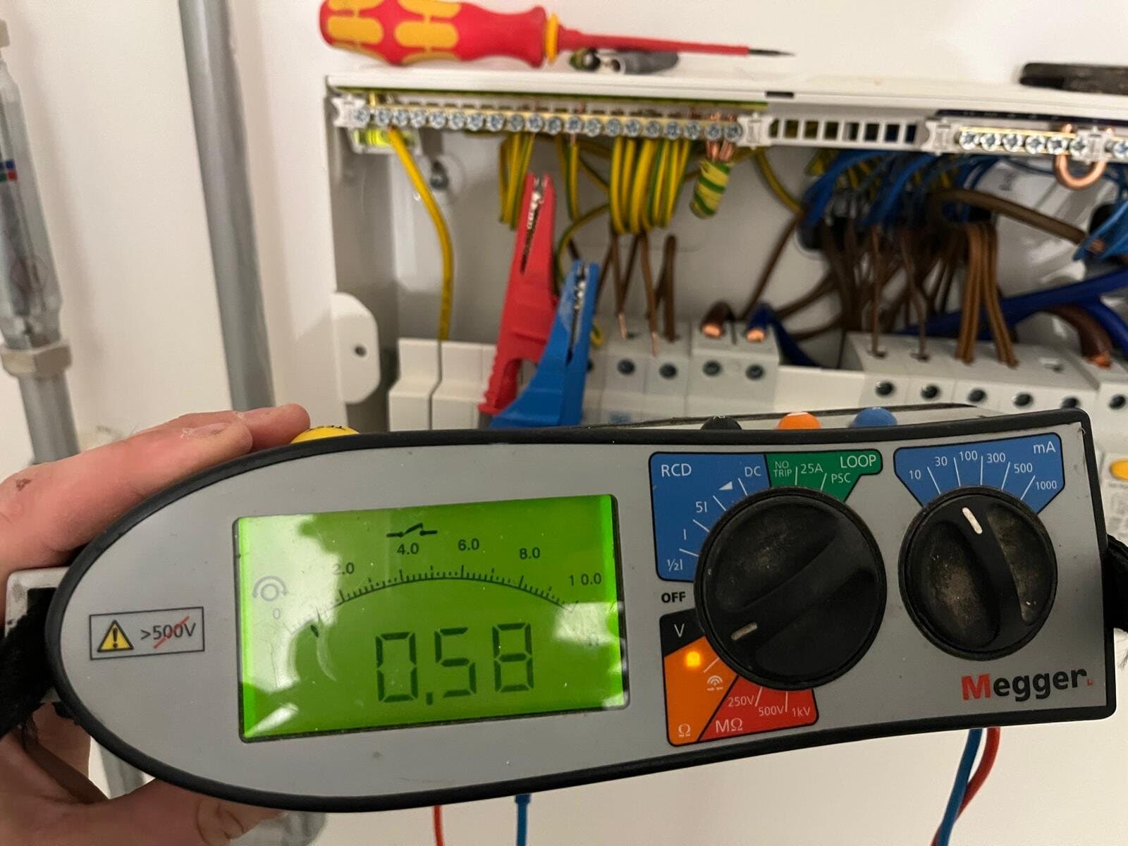 Megger tester reading on a consumer unit during testing