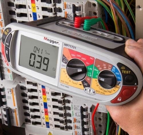 Megger multifunction tester in use on a distribution board