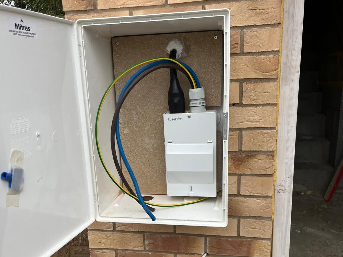 New supply box fitted on a new build wall